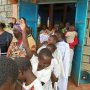 Children being baptised into the Holy and Apostolic Orthodox Church of Christ